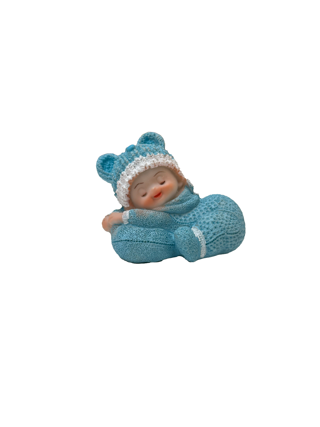 Figurine bébé sur coussin