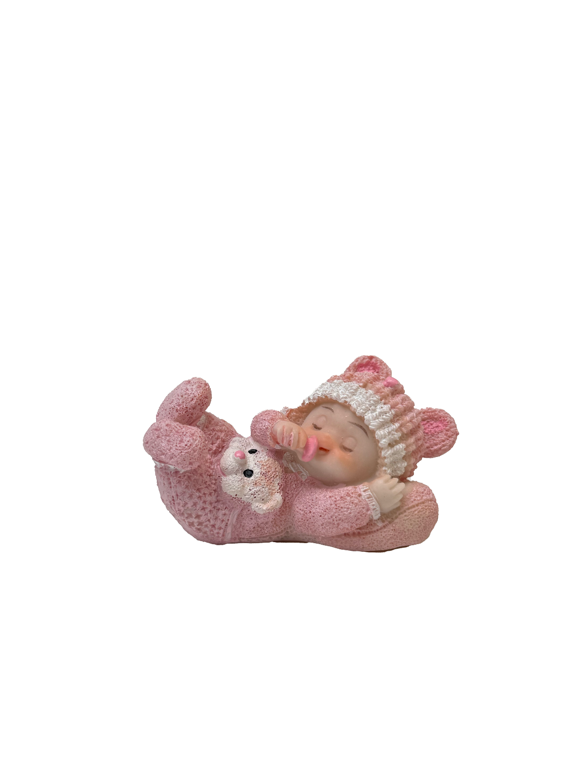 Figurine bébé sur coussin